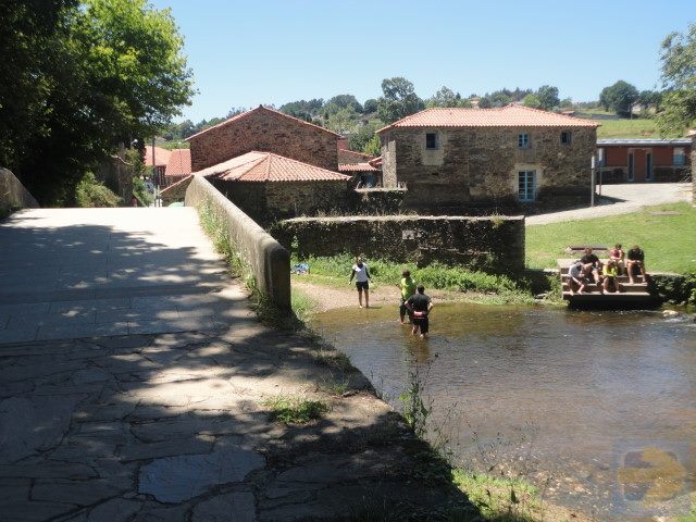 Medieval bridge over the Iso River in Ribadiso.