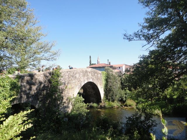 Medieval bridge at the entrance to Furelos.