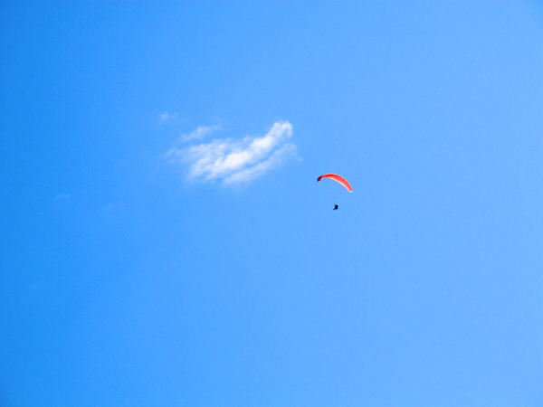 Paraglider being chased by a cloud