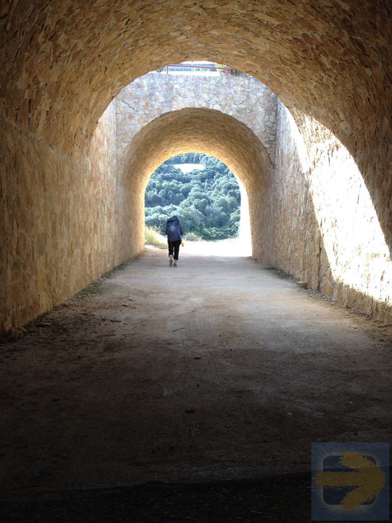 Pilgrim in Camino Tunnel